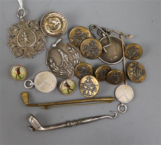 Eighteen assorted golf related items including silver medallions, Edwardian silver golf club button hook, silver button etc.